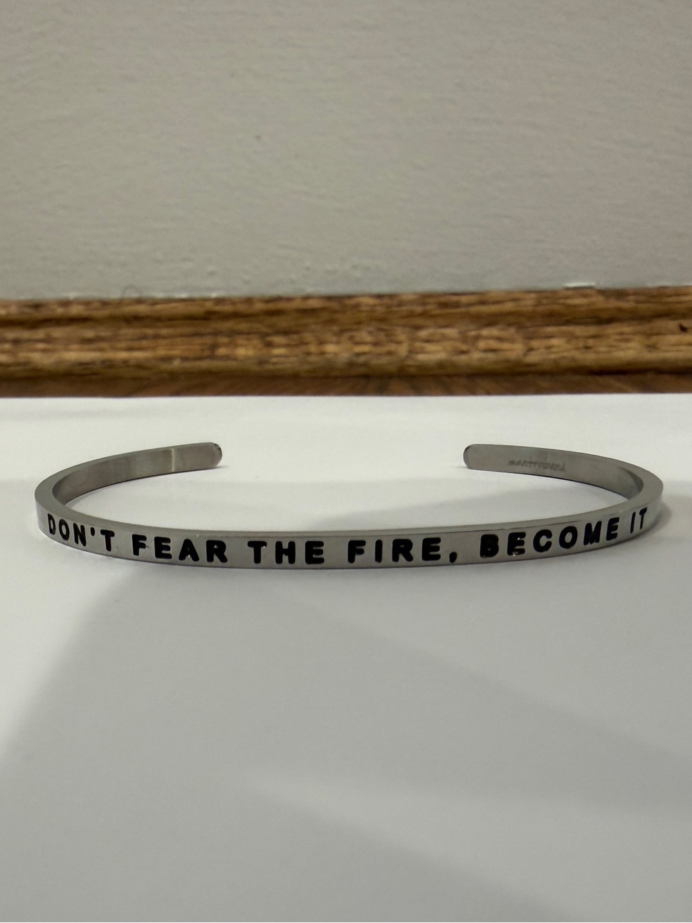 Mantraband Engraved Silver Cuff Bracelet - "Don't Fear The Fire, Become It”